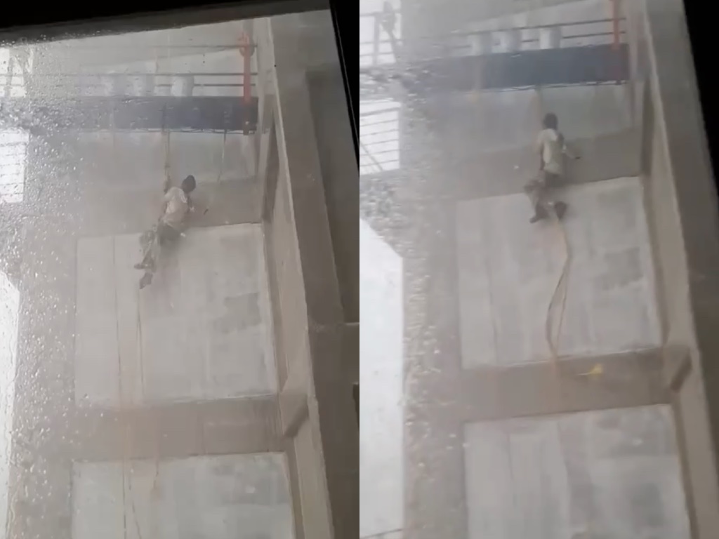 ¡De terror! En plena lluvia trabajador queda colgando de edificio en Lomas de Angelópolis