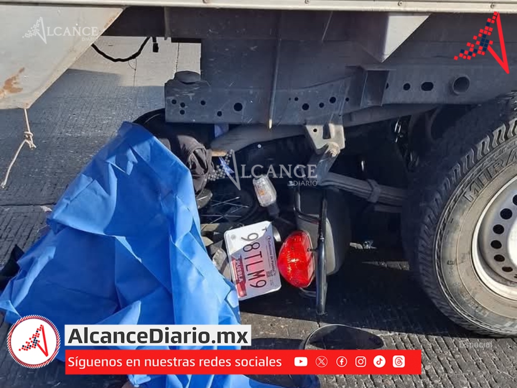 Motociclista camioneta Amozoc