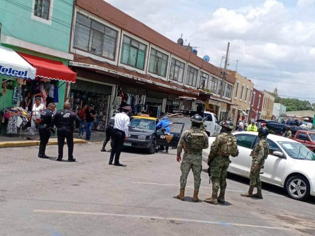 Detiene SSC de Cholula a nueve personas por conflicto en mercado Cosme del Razo